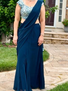 Elegant Teal Blue  corset lehenga set with Embroidered Blouse.